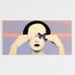Artistic depiction of a person with a butterfly on their face against a colorful background