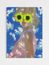 Person wearing a floral headband against a blue sky with white clouds