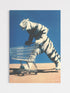 Stylized illustration of a tiger pushing a shopping cart against a blue background