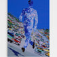 Abstract painting of a figure walking on a street with cars, blue sky