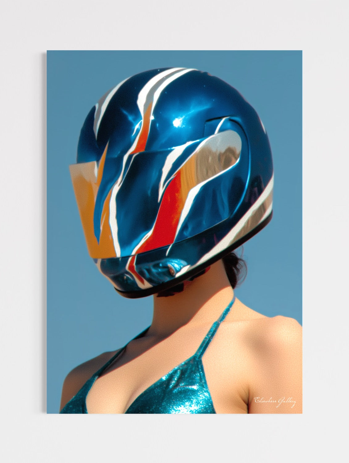 Person wearing a colorful motorcycle helmet against a clear blue sky