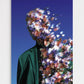 Person with floral overlay against a blue background
