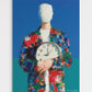Colorful abstract painting of a figure holding a clock against a blue background