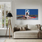 Living room with a beige sofa, abstract painting on the wall, and large windows.
