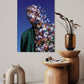Room interior with a wall art piece, wooden tables, and decorative items.