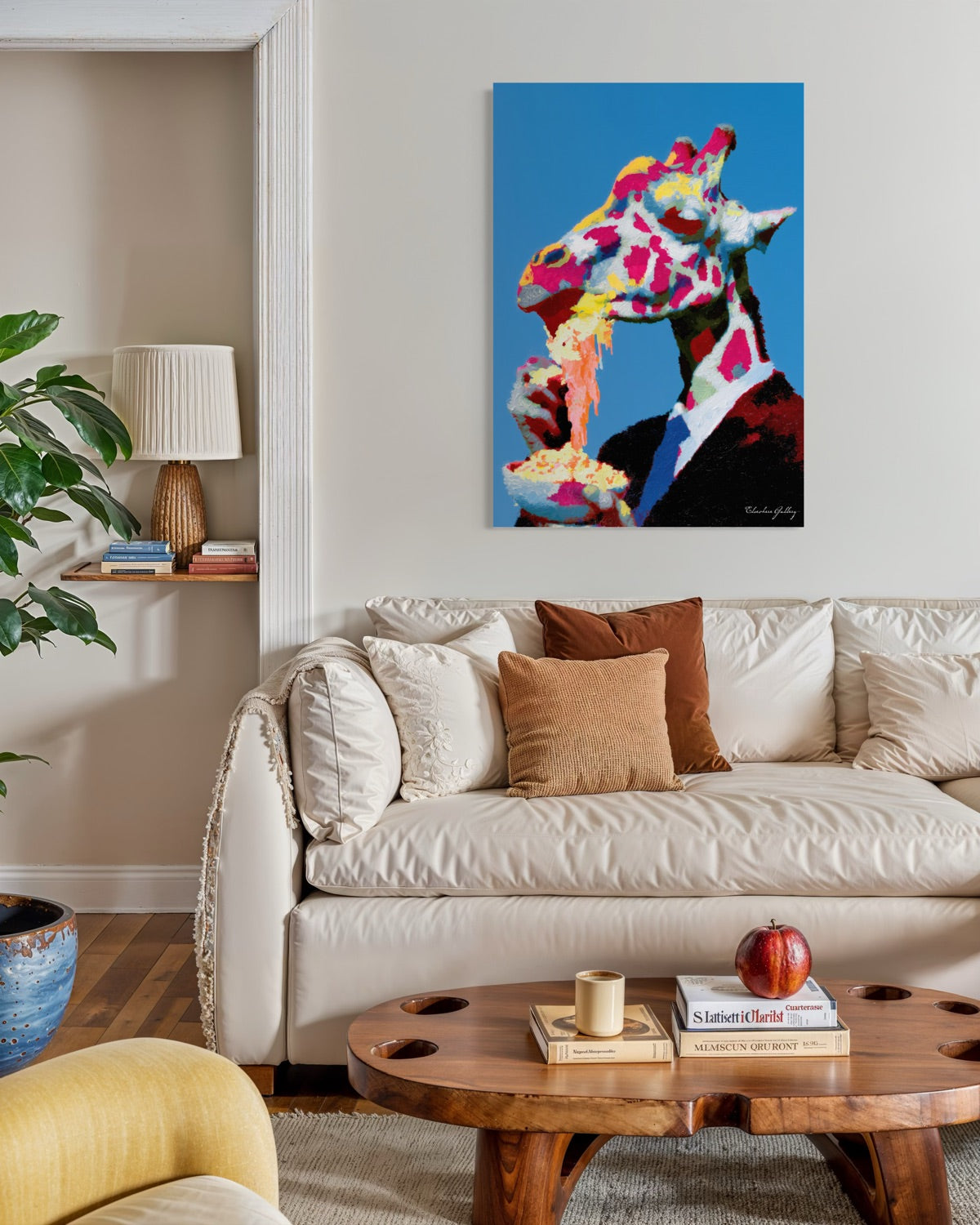 Living room with a colorful abstract painting above a beige sofa.