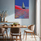 Dining room with a table and chairs, and a colorful abstract painting on the wall.