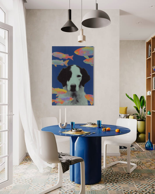 Dining room with a blue table and white chairs, featuring a colorful painting of a dog on the wall.