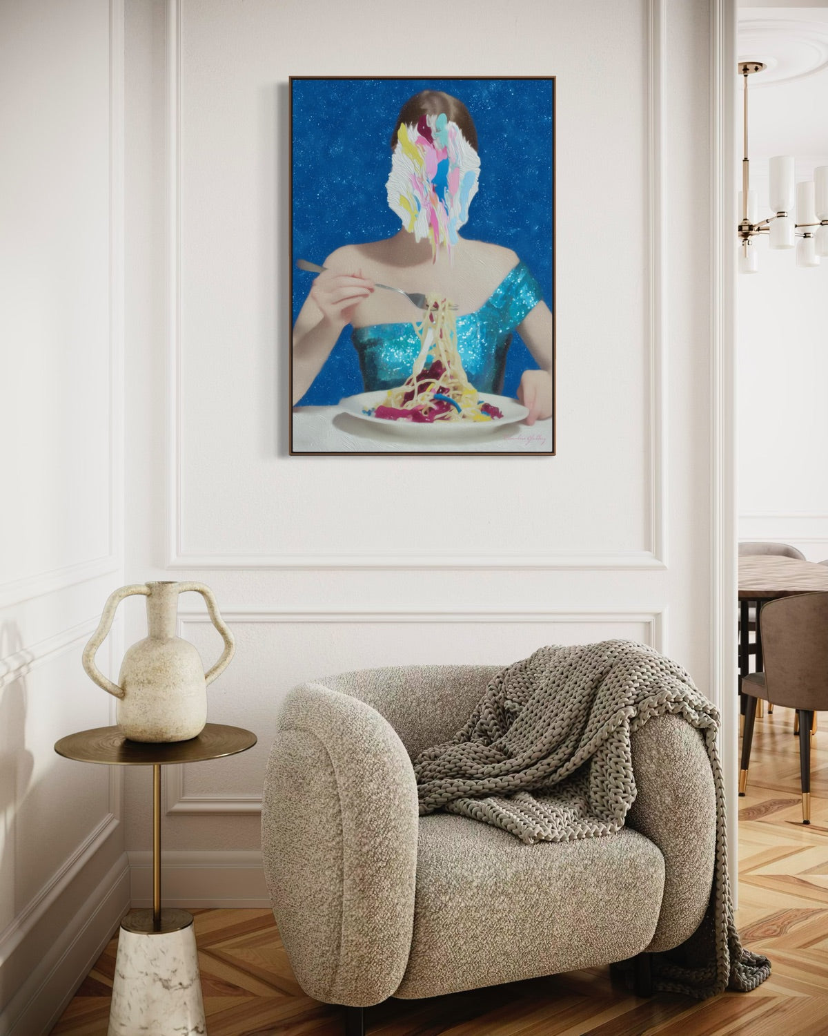Modern interior with a textured armchair, side table, and abstract painting on the wall.