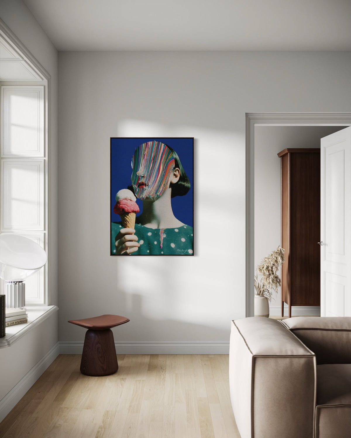 Modern interior with a colorful abstract painting of a woman holding an ice cream cone.
