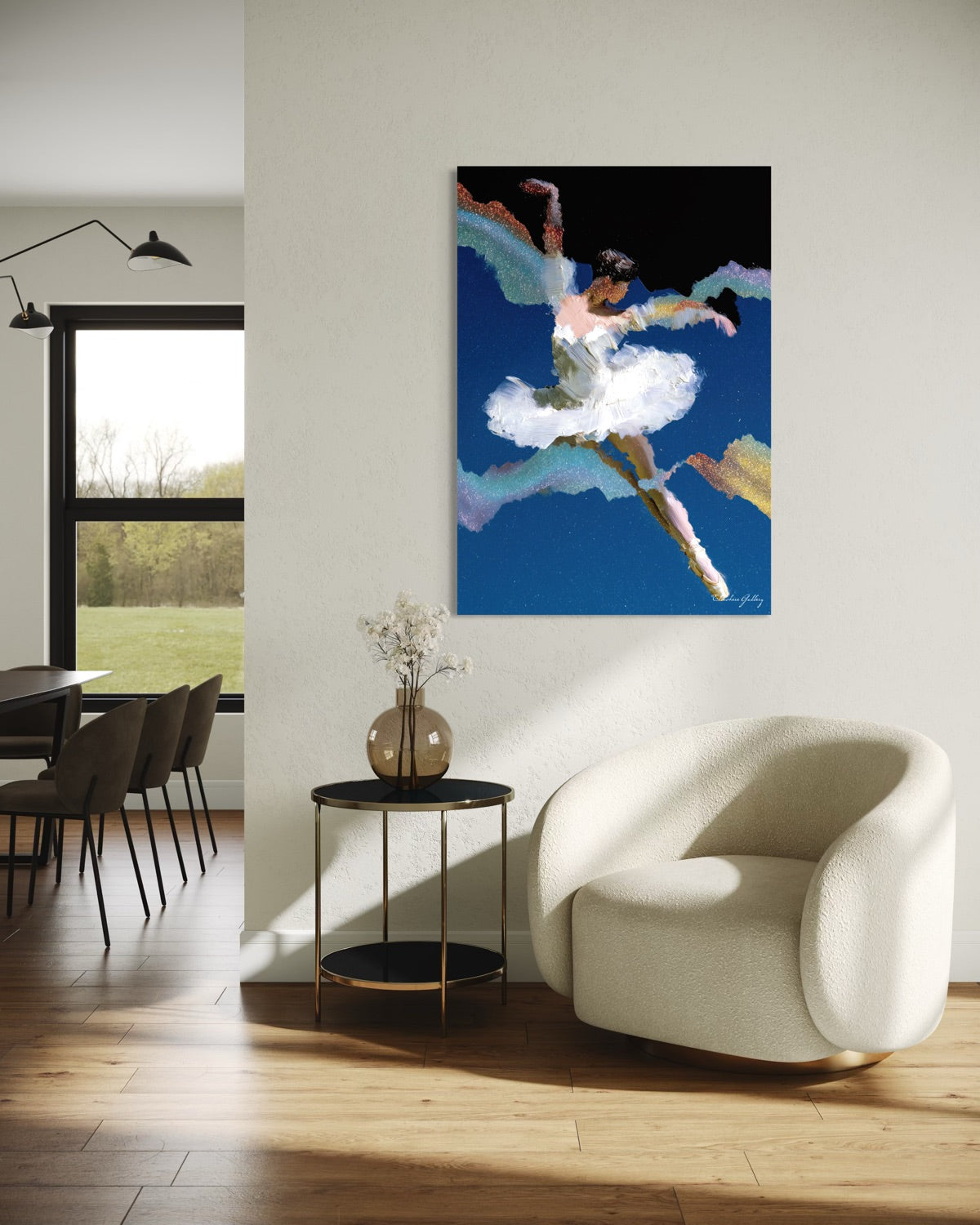 Modern living room with a white armchair, round table, and a colorful ballet dancer painting on the wall.
