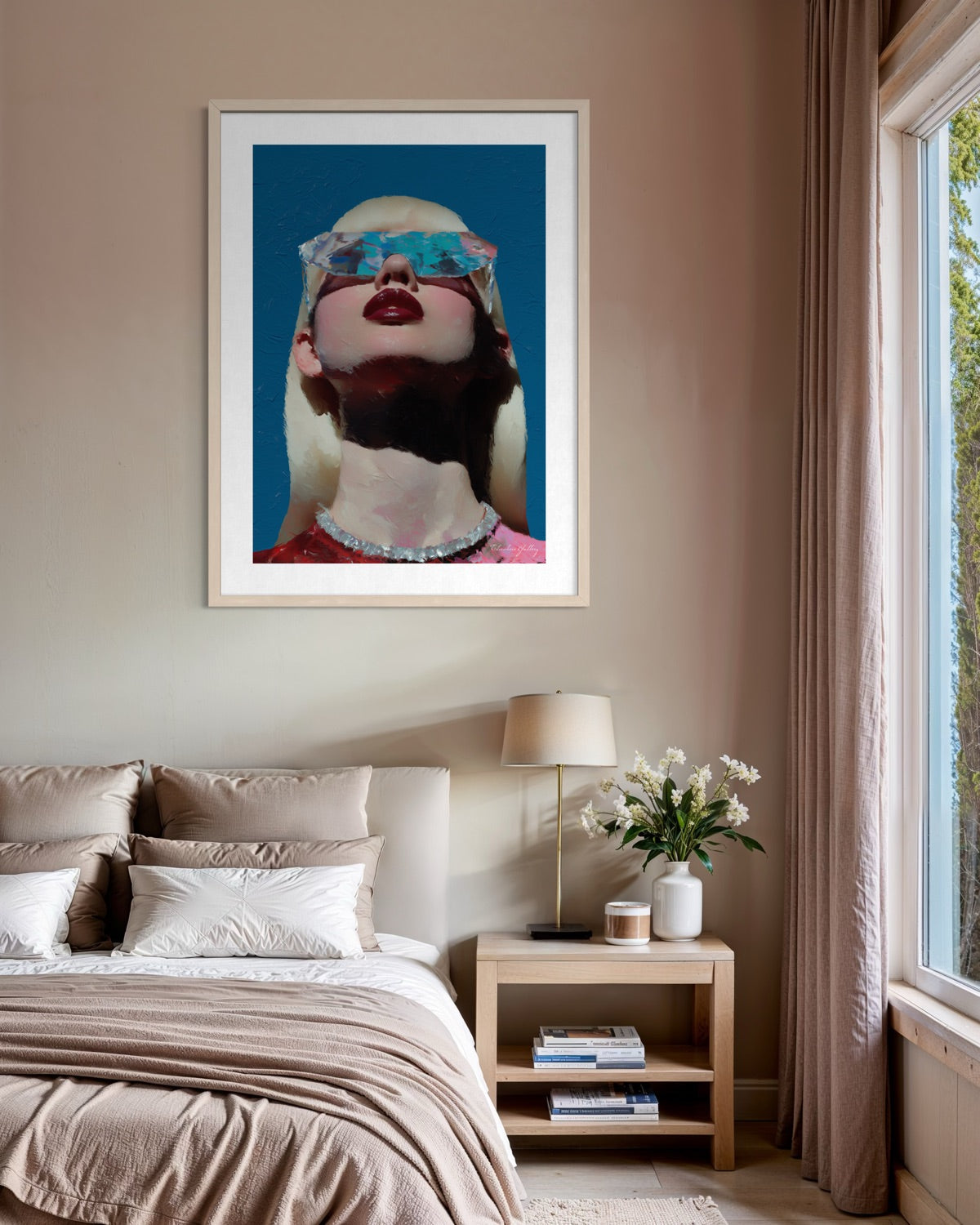 Framed artwork of a woman with sunglasses on a wall above a bed in a bedroom.