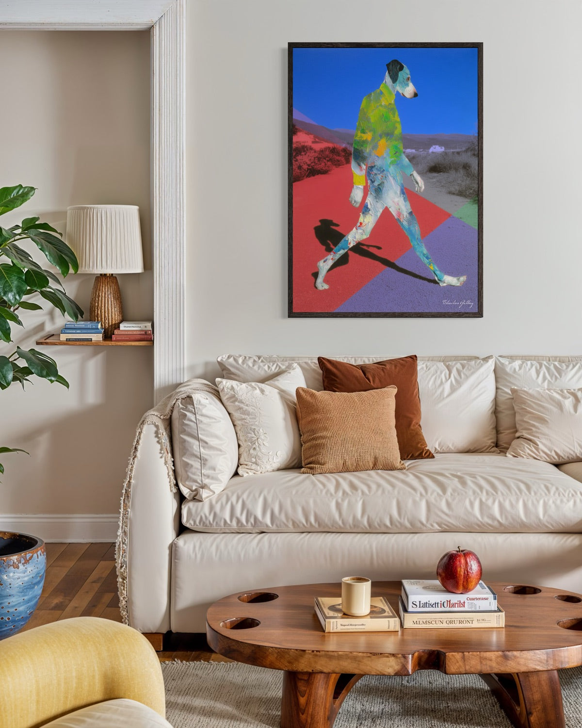 Living room with a colorful abstract painting above a beige sofa.
