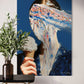 Abstract artwork of a person eating ice cream on a wall next to a plant.