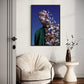 Framed artwork of a person with flowers superimposed on their face above a beige armchair.