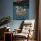 Chair in a room with a colorful painting of ducks in a shopping cart on the wall.