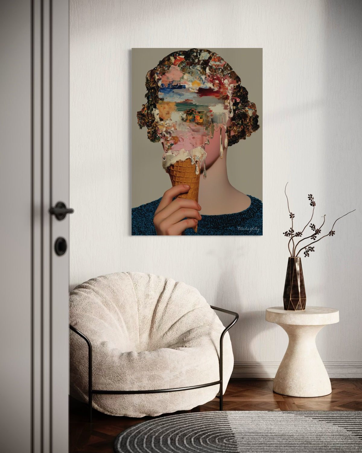 Modern interior with a chair, table, and decorative wall art.