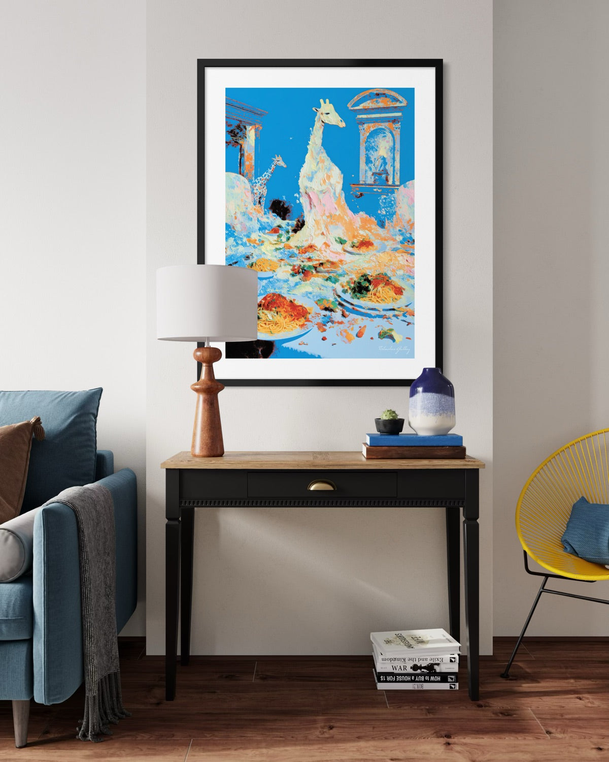 Framed artwork above a console table in a living room setting.