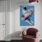 Colorful abstract painting of a dancer on a blue background in a modern room with a pink armchair.