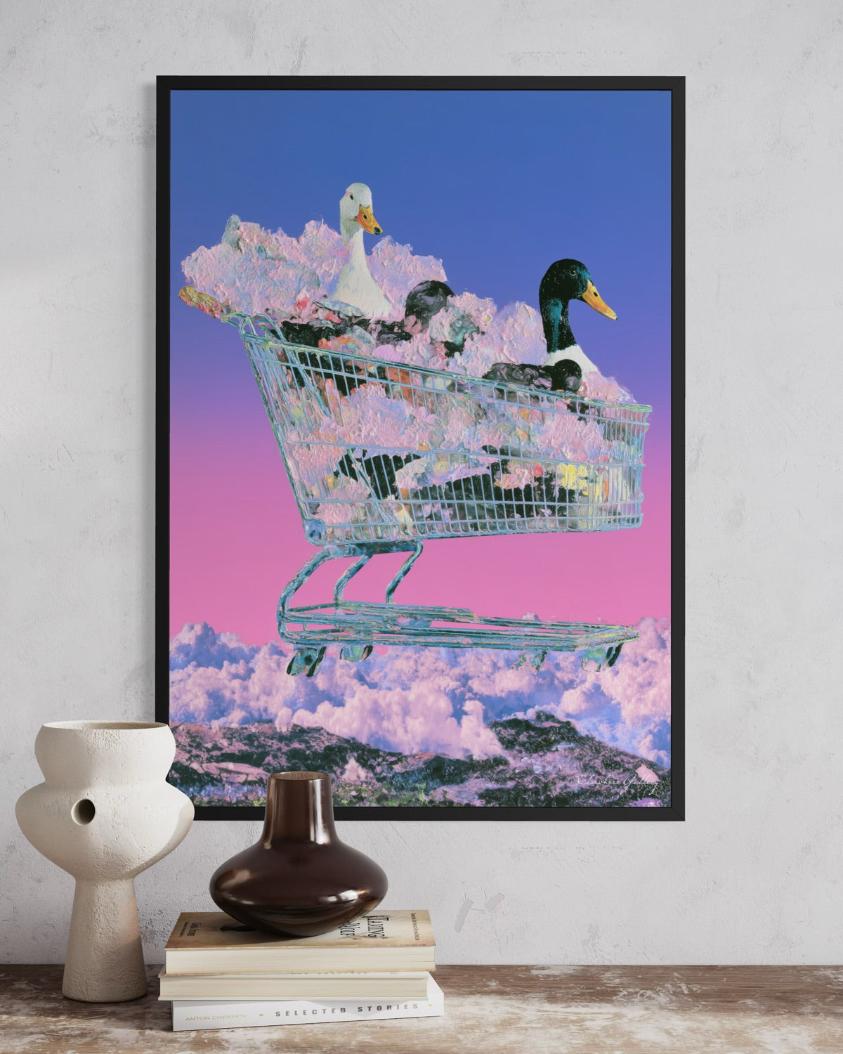 Framed artwork of ducks in a shopping cart with a colorful background on a wall.