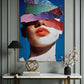 Colorful abstract art piece on a wall above a marble console table with decorative items.