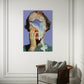 Framed artwork on a wall above a modern chair with a gray cushion.