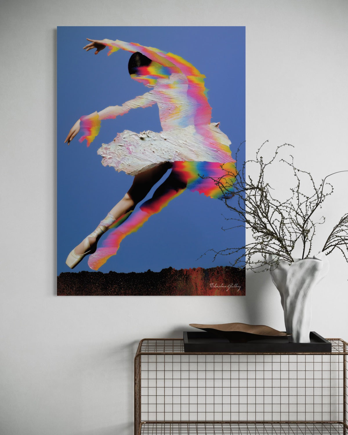 Canvas print of a dancer with colorful abstract patterns on a wall above a console table.