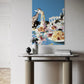 Colorful abstract painting of a giraffe and architectural elements on a wall above a table.