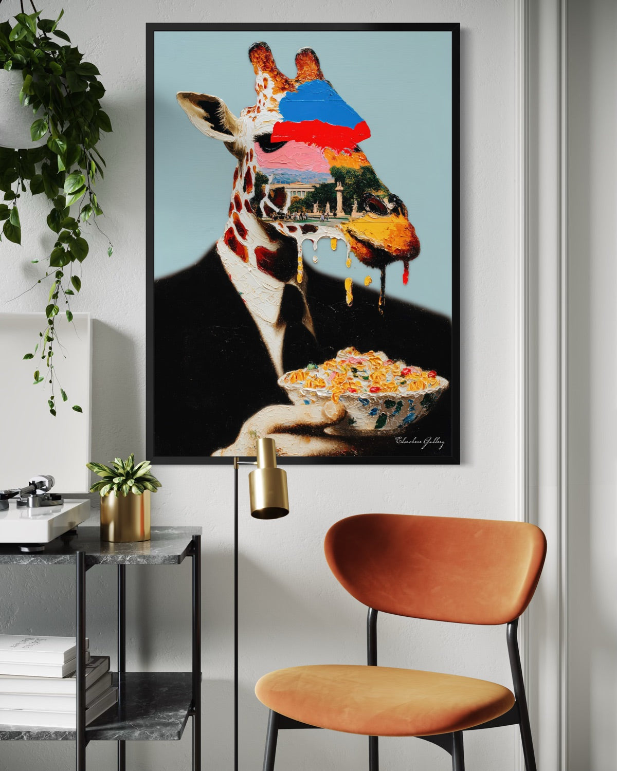 Framed artwork of a giraffe in a suit holding a bowl of cereal in a modern interior setting.