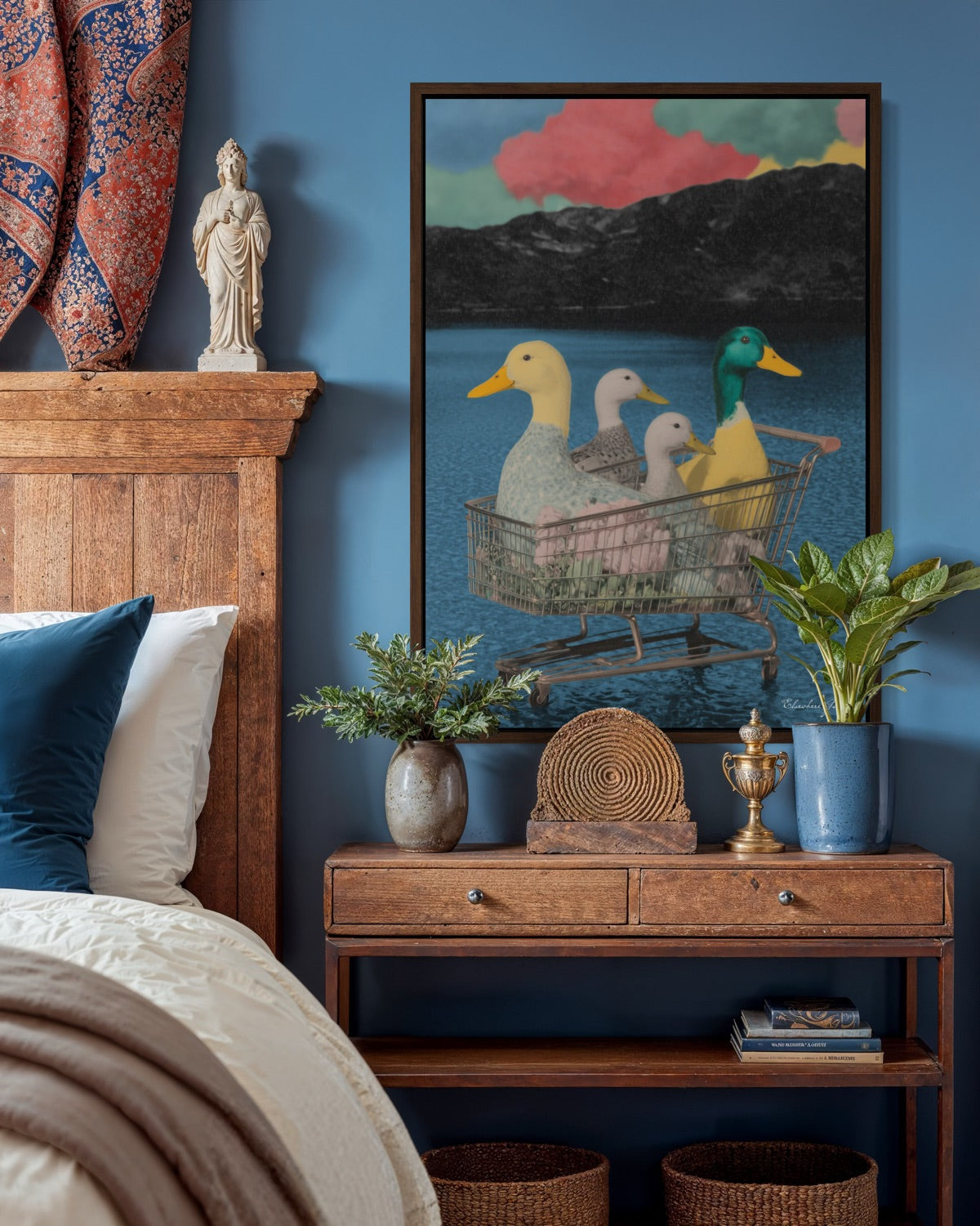 Nursery room with wooden furniture, decorative items, and a colorful painting of ducks.