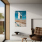 Modern living room with a brown leather chair, small table, and abstract artwork on the wall.