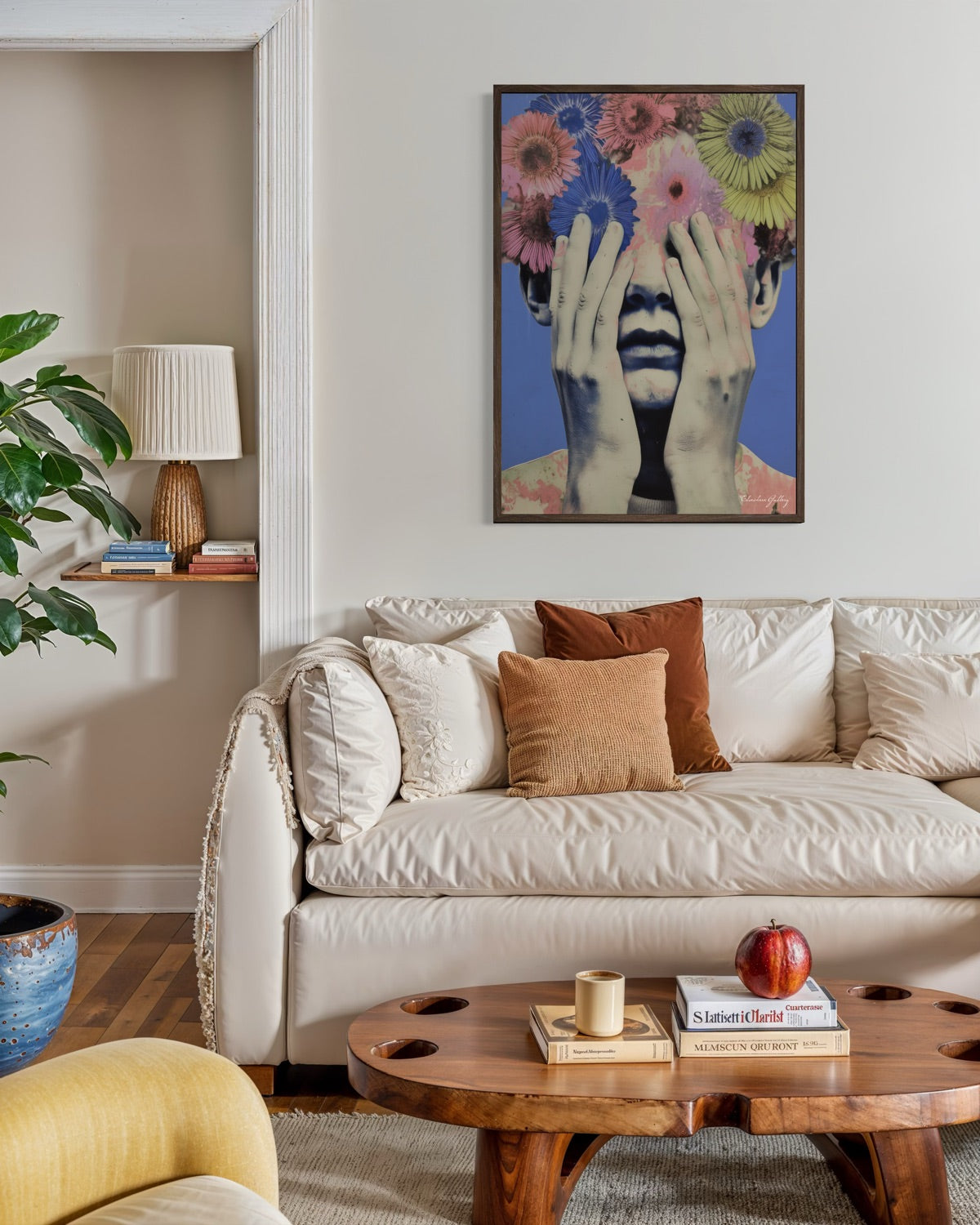Living room with a beige sofa, wooden coffee table, and colorful wall art.