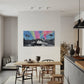 Modern dining area with a colorful abstract painting on the wall