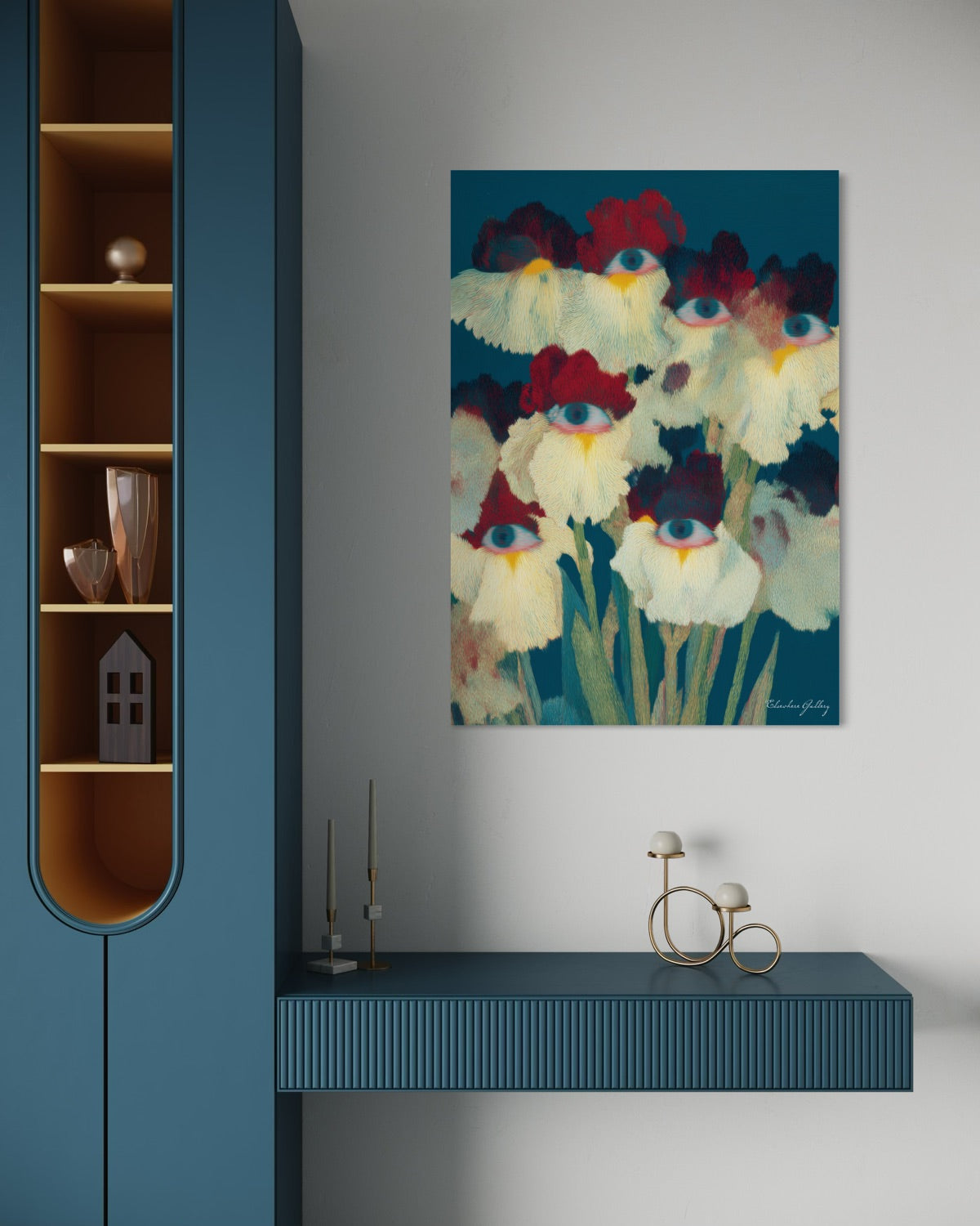 Modern interior with a blue cabinet, shelf, and abstract floral painting on a white wall.