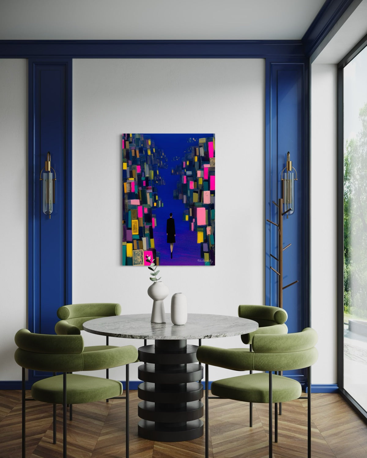Modern dining room with a round table and green chairs, featuring a colorful abstract painting on the wall.