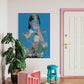 Modern interior with colorful artwork, pink furniture, and a plant.
