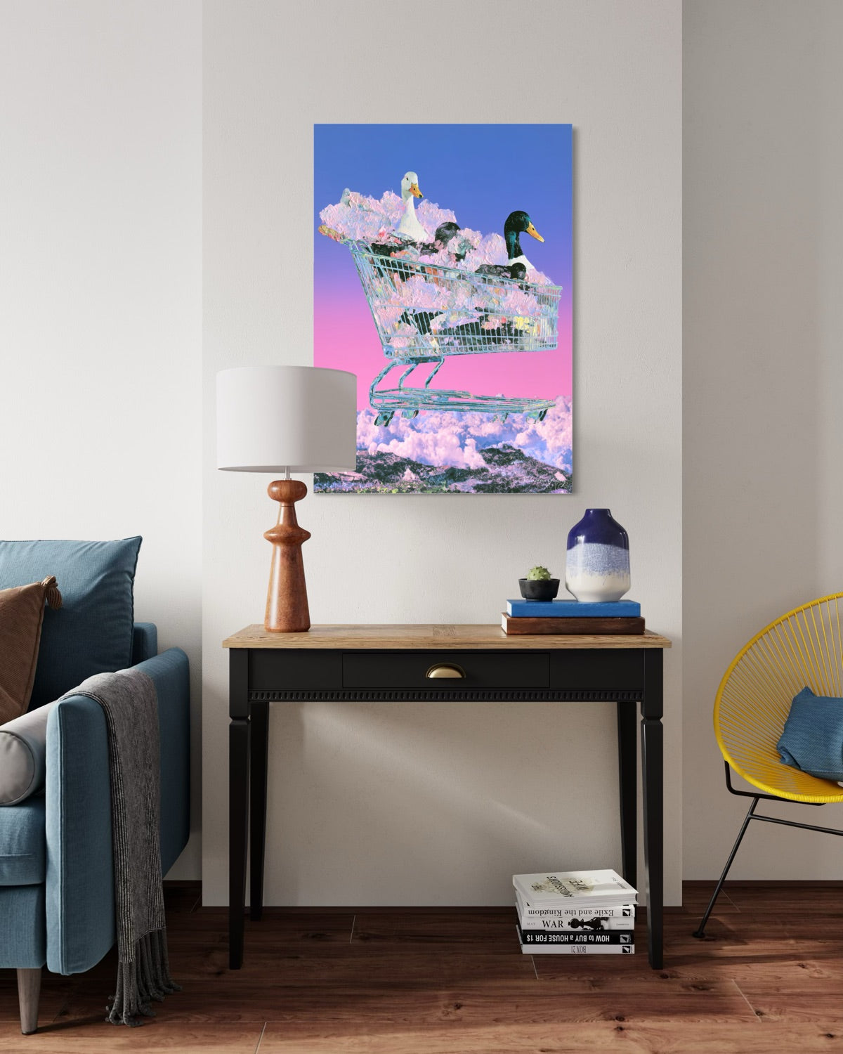 Modern living room with a colorful painting of ducks in a shopping cart on the wall.