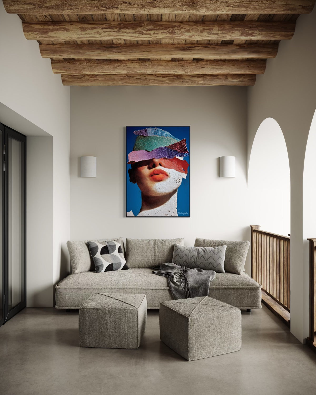 Modern living room with a gray sectional sofa, geometric ottomans, and a colorful abstract painting on the wall.