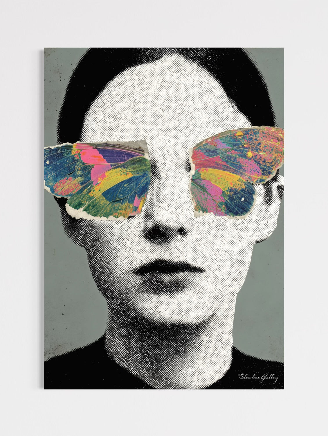 Striking surrealist collage wall art print featuring a vintage halftone dot portrait of a woman's face with colorful, textured butterfly wings covering her eyes against a muted grey background, titled "The Wings of Denial״.